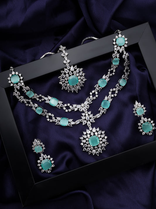 SAMPOORN'S AMERICAN DIAMOND STUDDED GREEN MINT STONE NECKLACE WITH EARRINGS AND MAANG TIKKA