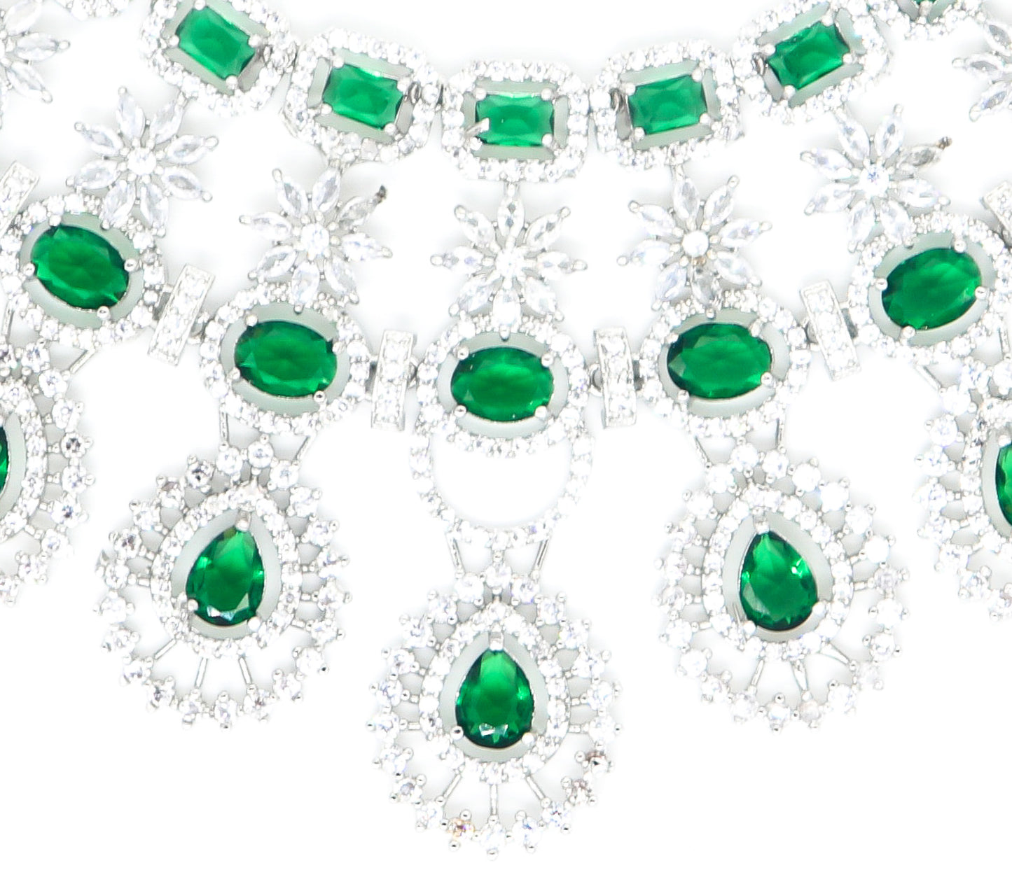 SAMPOORN'S AMERICAN DIAMOND STUDDED BOTTLE GREEN STONE NECKLACE WITH EARRINGS AND MAANG TIKKA