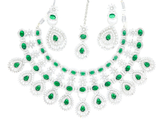 SAMPOORN'S AMERICAN DIAMOND STUDDED BOTTLE GREEN STONE NECKLACE WITH EARRINGS AND MAANG TIKKA